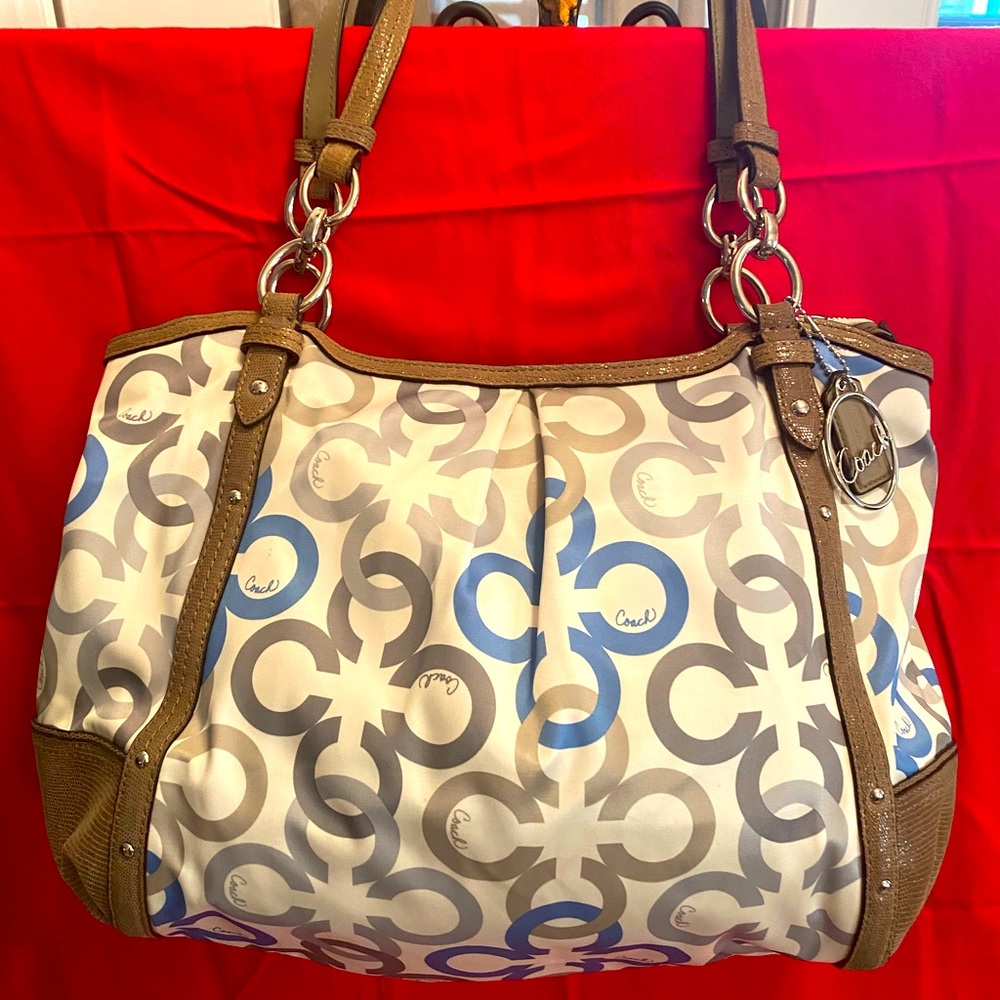 Coach very nice used very little cleaning out my closet